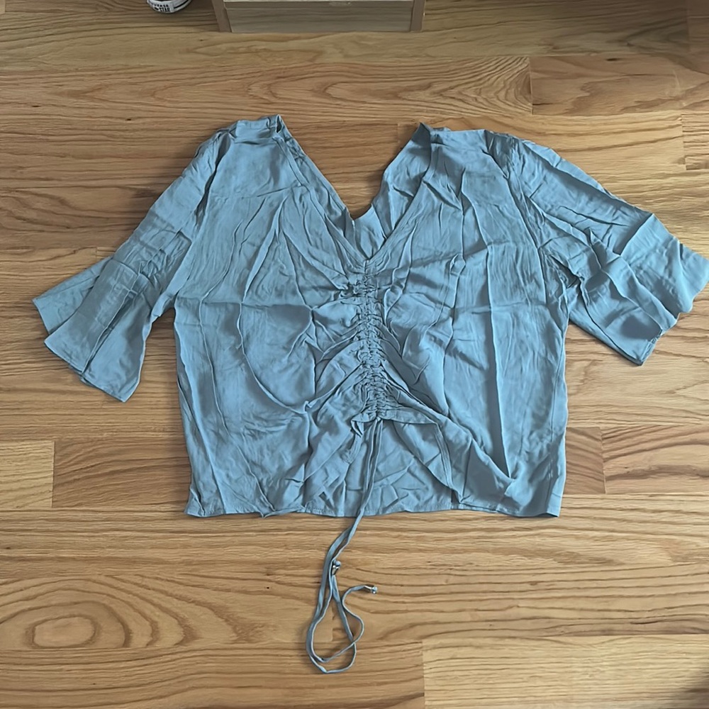 Cute adjustable blue top